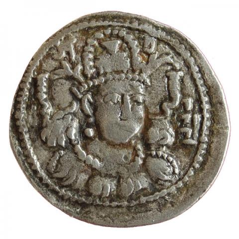 Crowned bust in three-quarter view; Brahmi inscription "Srivarma"