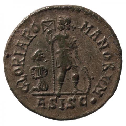 Emperor standing, holding labarum and shield, on the left: captive