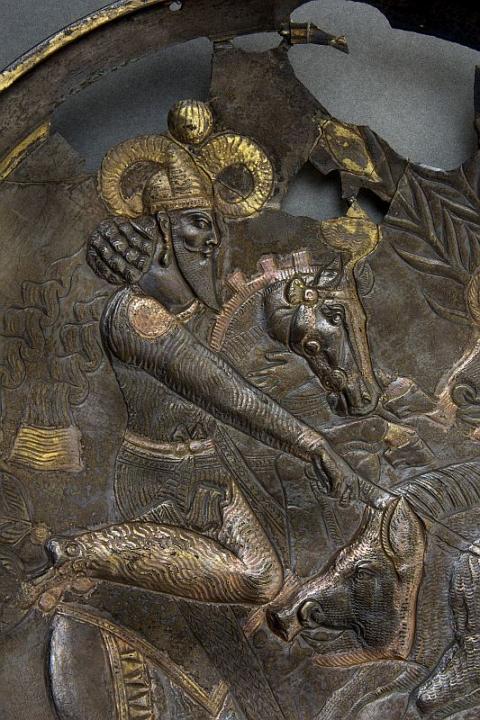 A. Silver plate (partially gilded) with the Sasanian king hunting wild boar. 4th century CE. Found in 1893 in Kercheva (Ural foothills, Perm’ region). (© St. Petersburg, State Hermitage Museum, Inv.-Nr. S-24)